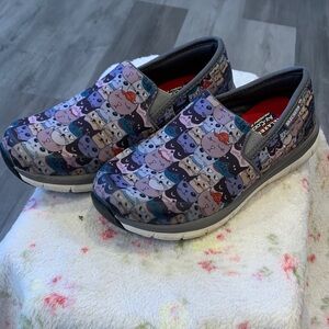 Skechers Slip-On Sneakers in Purple Multicolor Cat Print